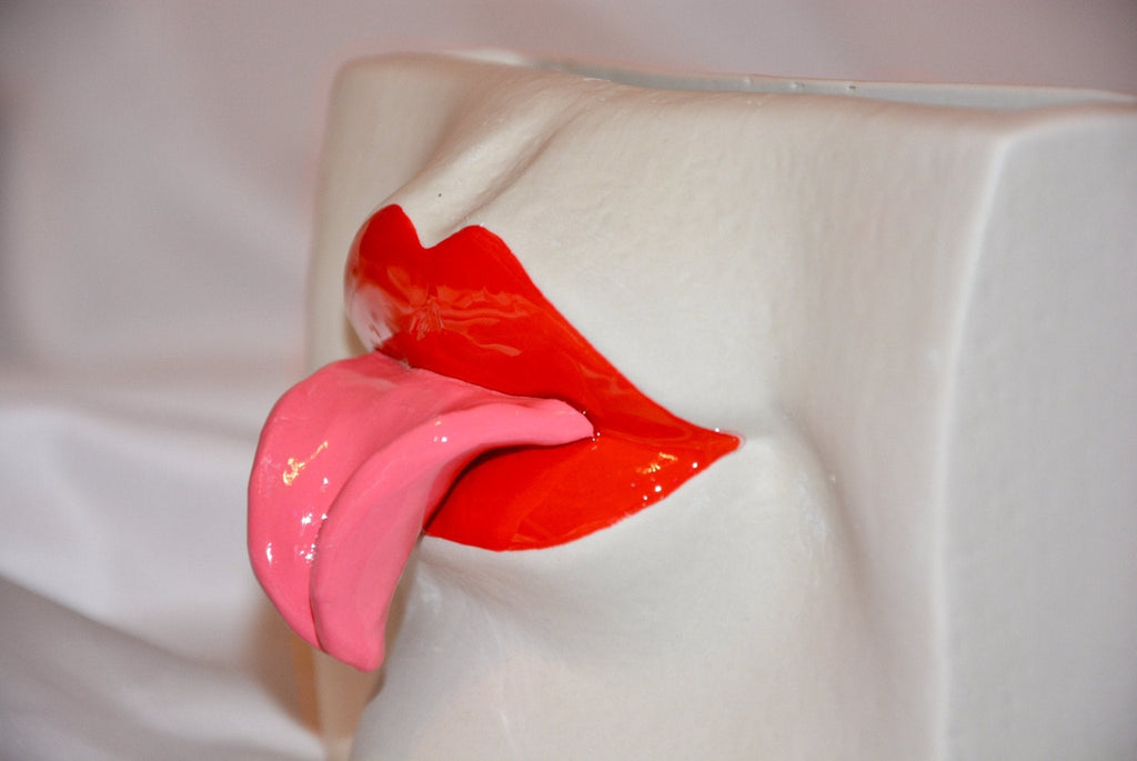 CERAMIC TONGUE-OUT VASE