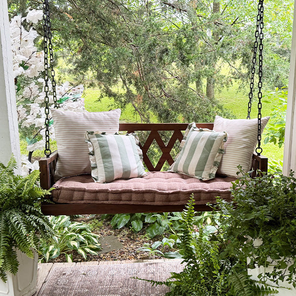 Brown Porch Swing with Cushion